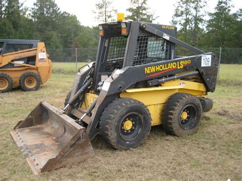 05 new holland ls160 skid steer|new holland ls160 attachment release.